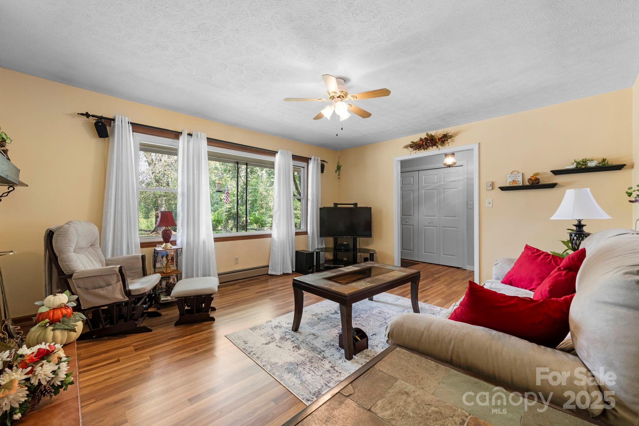 3651 Pea Ridge Road Morganton, NC 28655 - Photo 11 of 43 a living room with furniture and a window