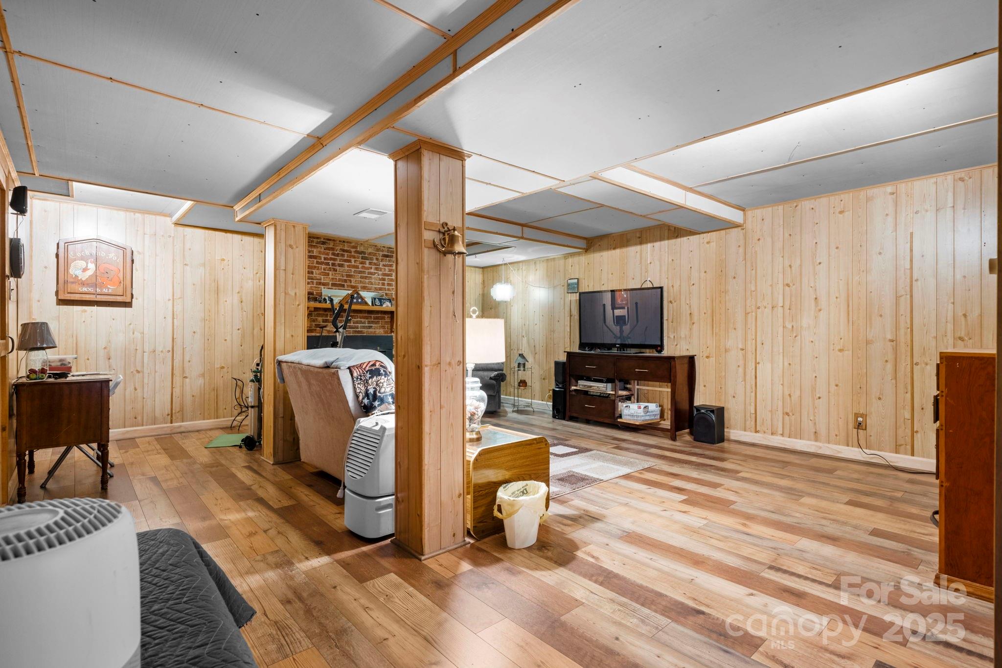 3651 Pea Ridge Road Morganton, NC 28655 - Photo 25 of 43 a view of a livingroom with furniture and a flat screen tv