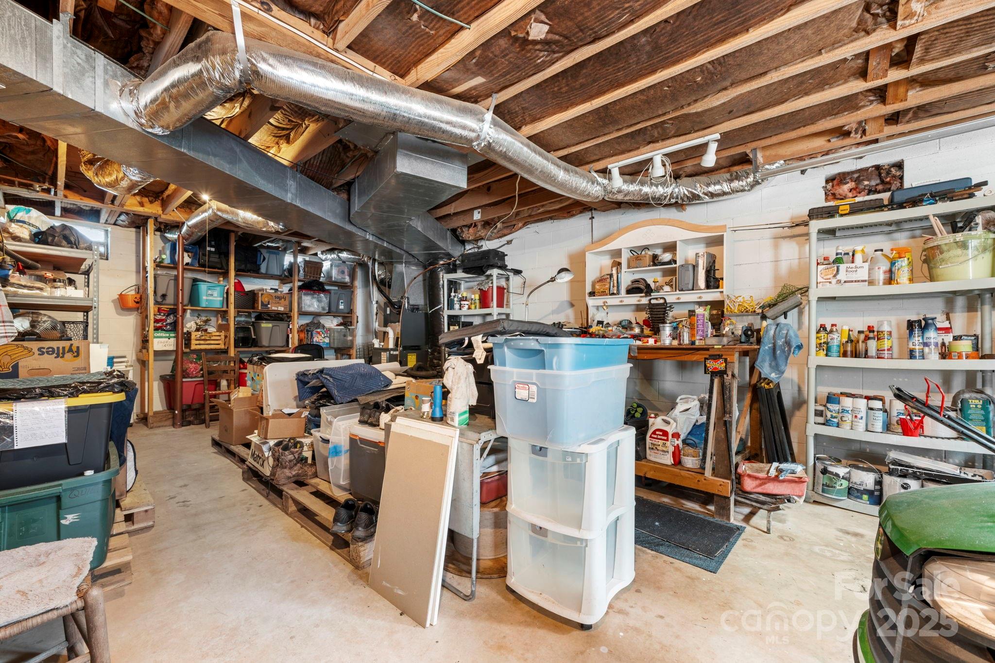 3651 Pea Ridge Road Morganton, NC 28655 - Photo 28 of 43 a utility room with lots of wooden furniture