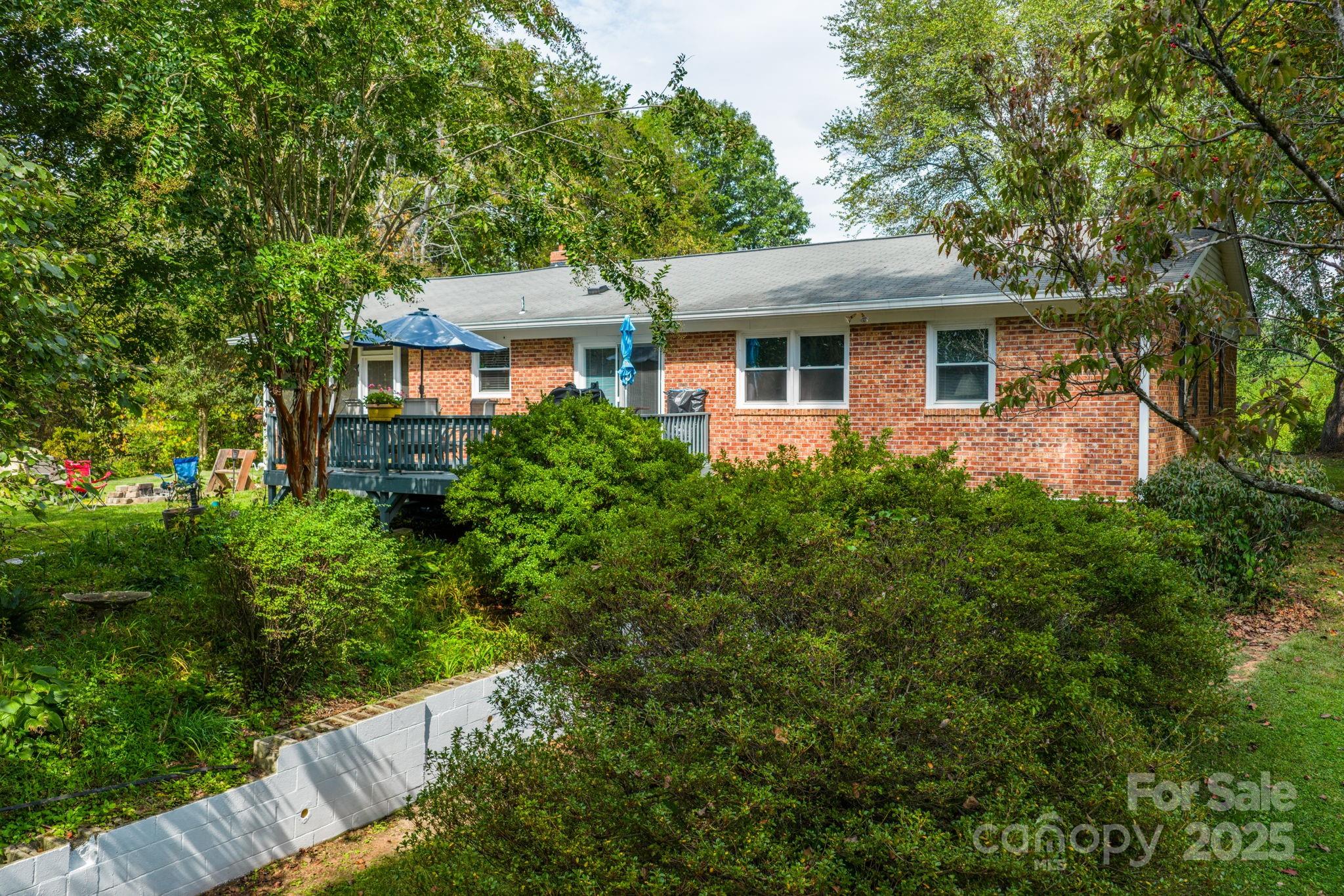 3651 Pea Ridge Road Morganton, NC 28655 - Photo 33 of 43 a front view of a house with a yard