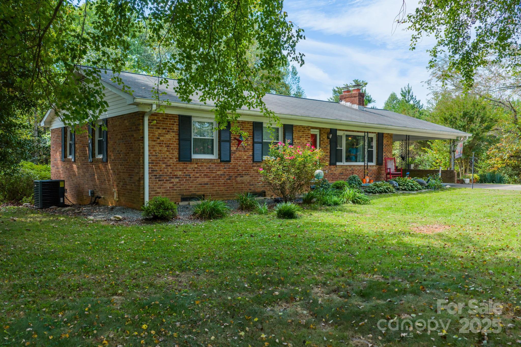 3651 Pea Ridge Road Morganton, NC 28655 - Photo 35 of 43 a front view of house with yard and green space