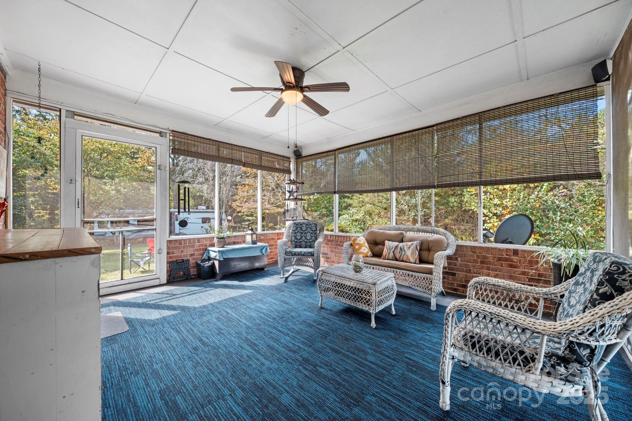 3651 Pea Ridge Road Morganton, NC 28655 - Photo 37 of 43 a living room with furniture and a large window