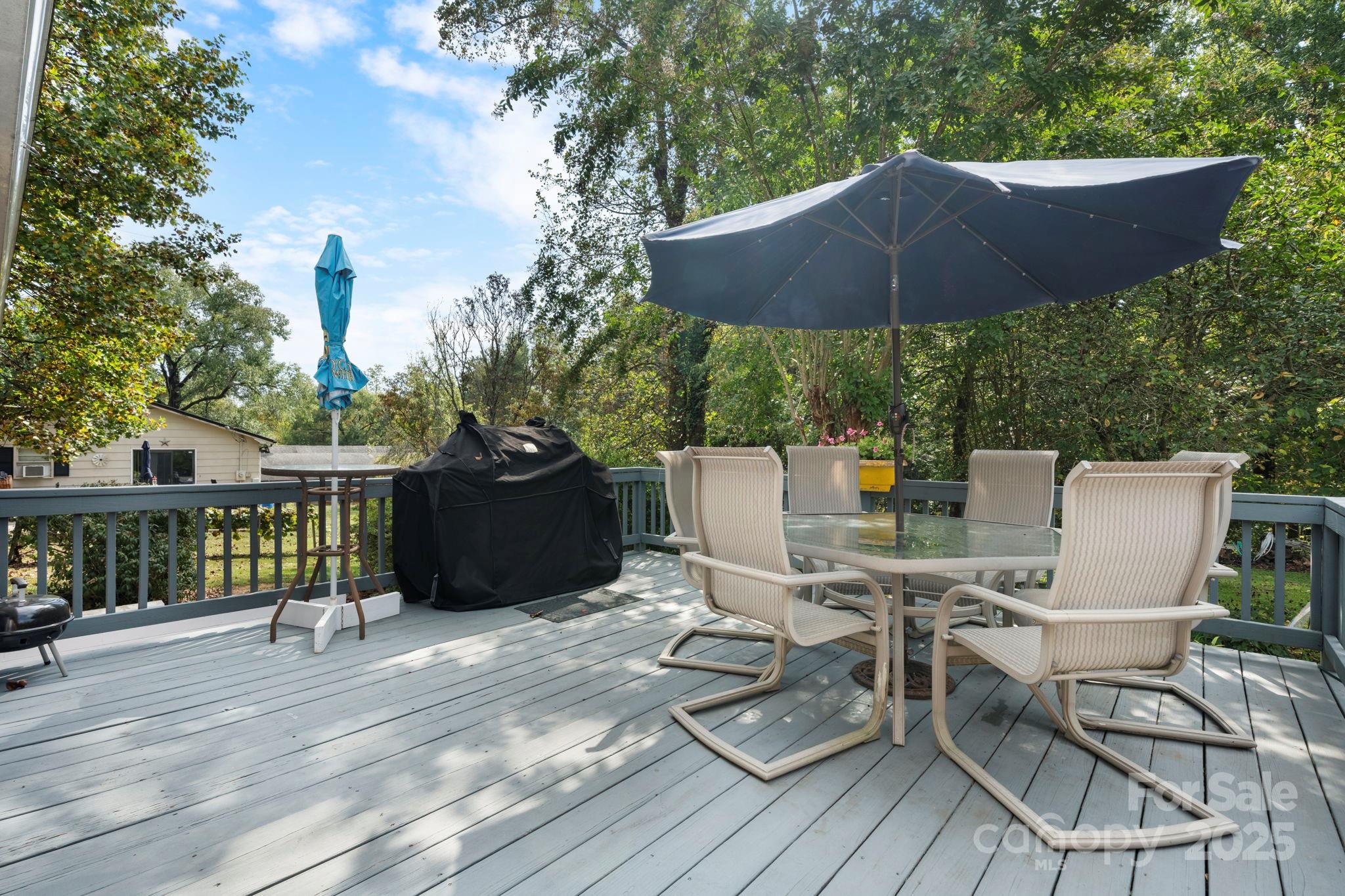 3651 Pea Ridge Road Morganton, NC 28655 - Photo 38 of 43 a view of a chairs and table on the wooden floor