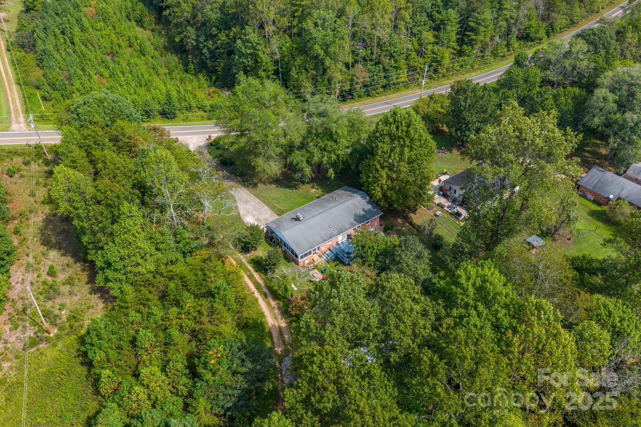 3651 Pea Ridge Road Morganton, NC 28655 - Photo 43 of 43 an aerial view of a house with a yard