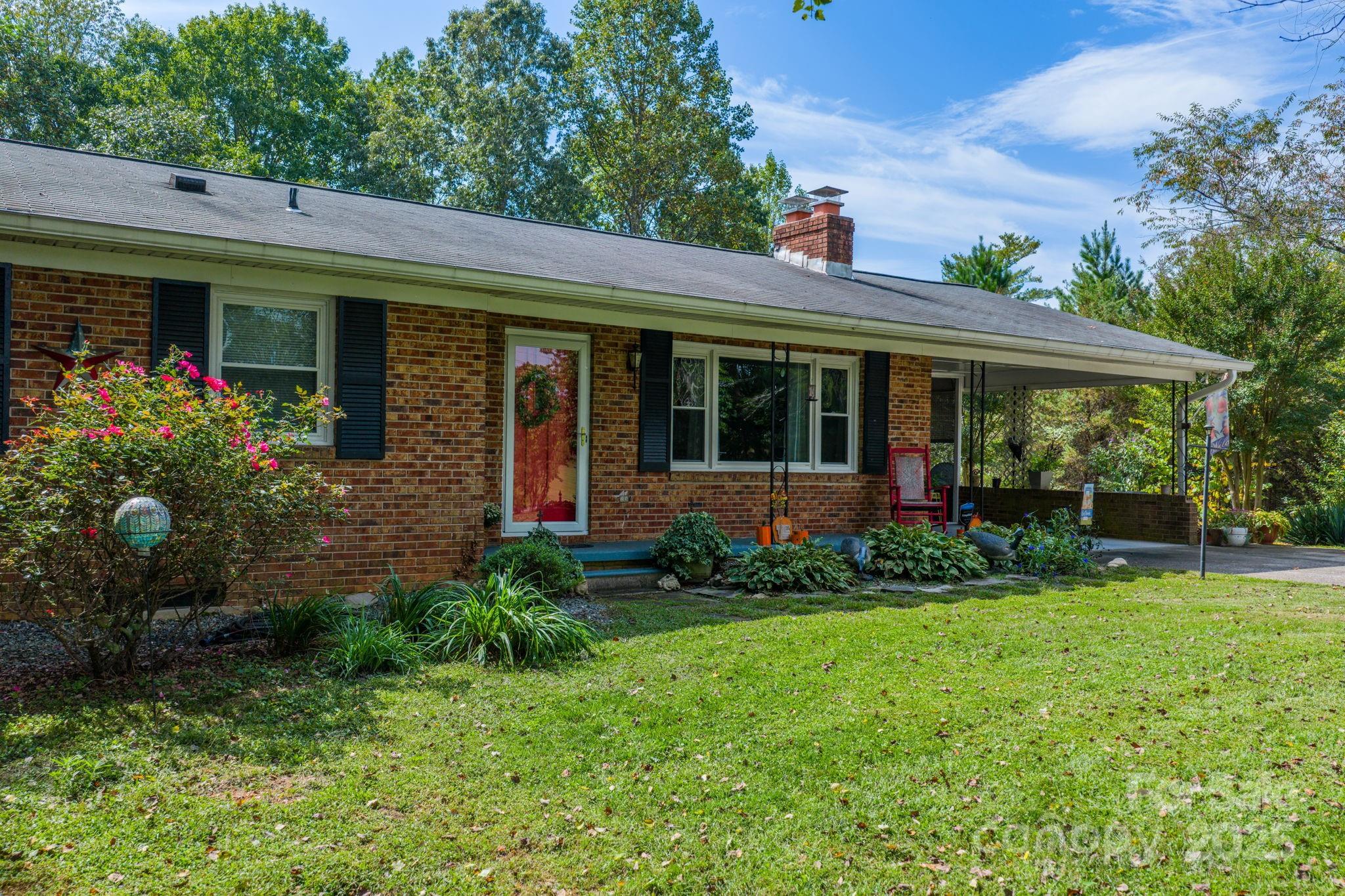 3651 Pea Ridge Road Morganton, NC 28655 - Photo 5 of 43 front view of a house with a yard