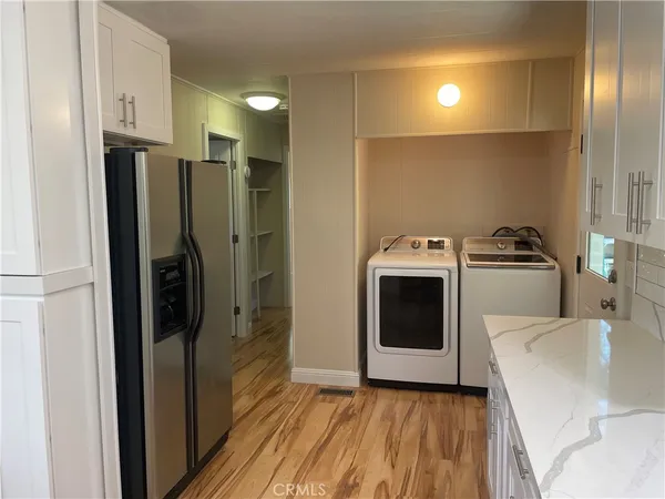 a utility room with washer and dryer