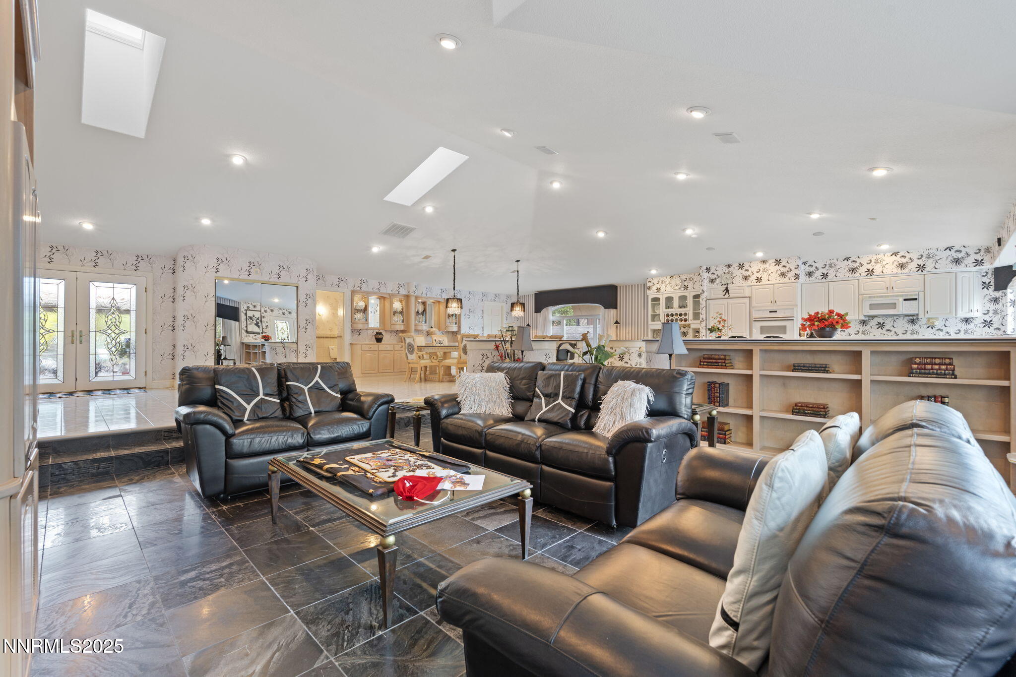 5195 Canyon Drive Reno, NV 89519 - Photo 17 of 69 a living room with furniture kitchen view and a wooden floor