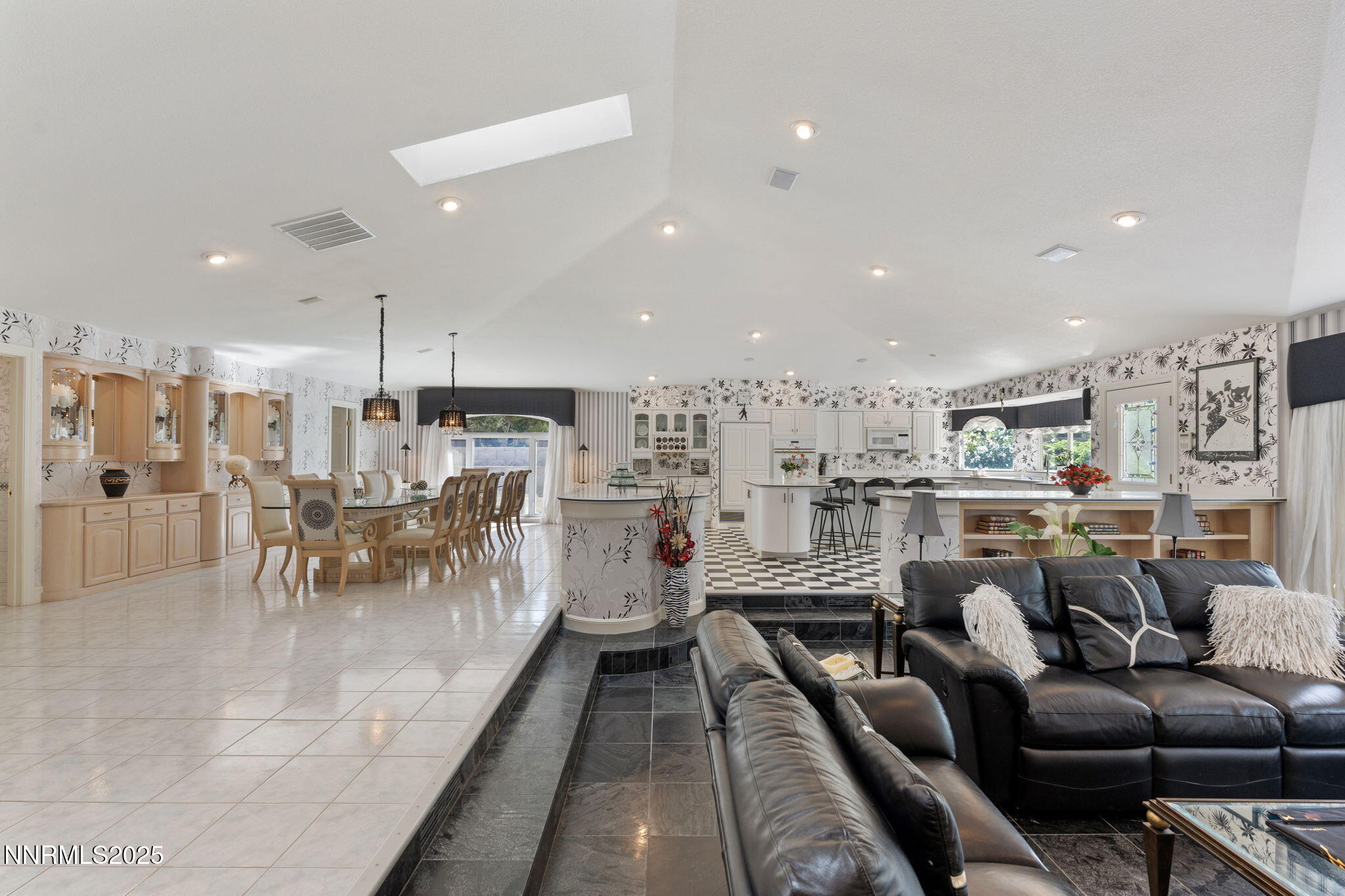 5195 Canyon Drive Reno, NV 89519 - Photo 19 of 69 a view of a living room and kitchen with stainless steel appliances