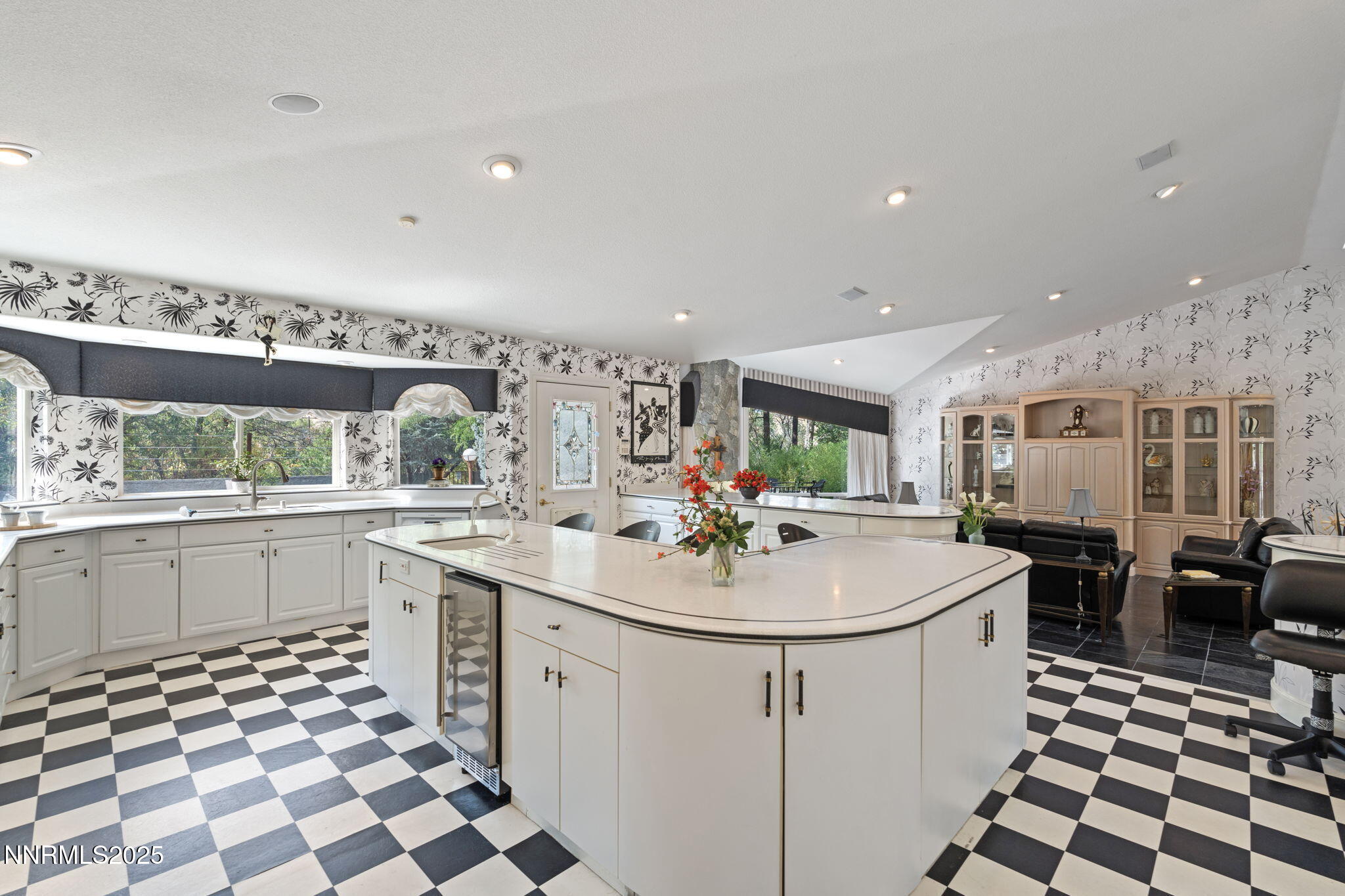 5195 Canyon Drive Reno, NV 89519 - Photo 24 of 69 a kitchen with a sink a stove a microwave and cabinets