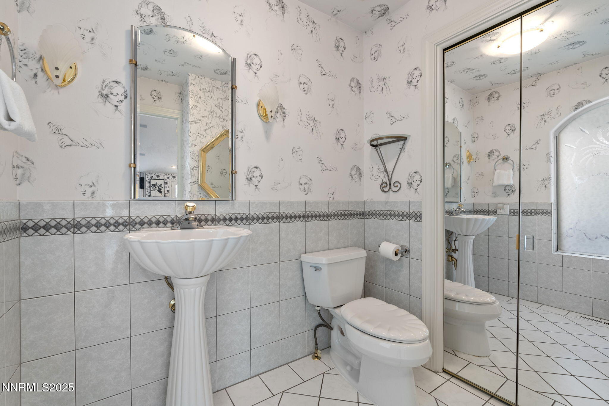 5195 Canyon Drive Reno, NV 89519 - Photo 28 of 69 a bathroom with a toilet sink and shower