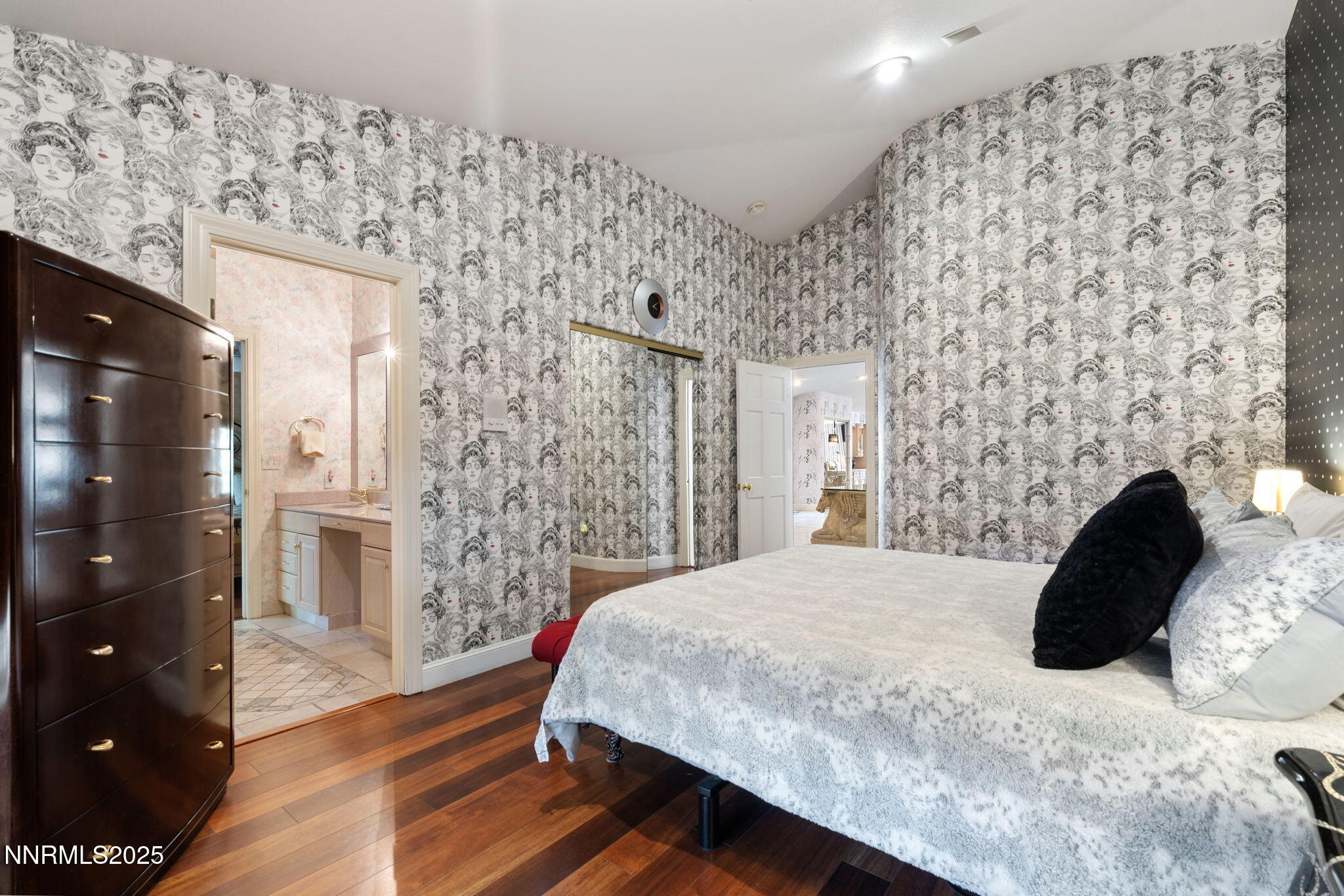 5195 Canyon Drive Reno, NV 89519 - Photo 38 of 69 a bedroom with a bed and a fireplace