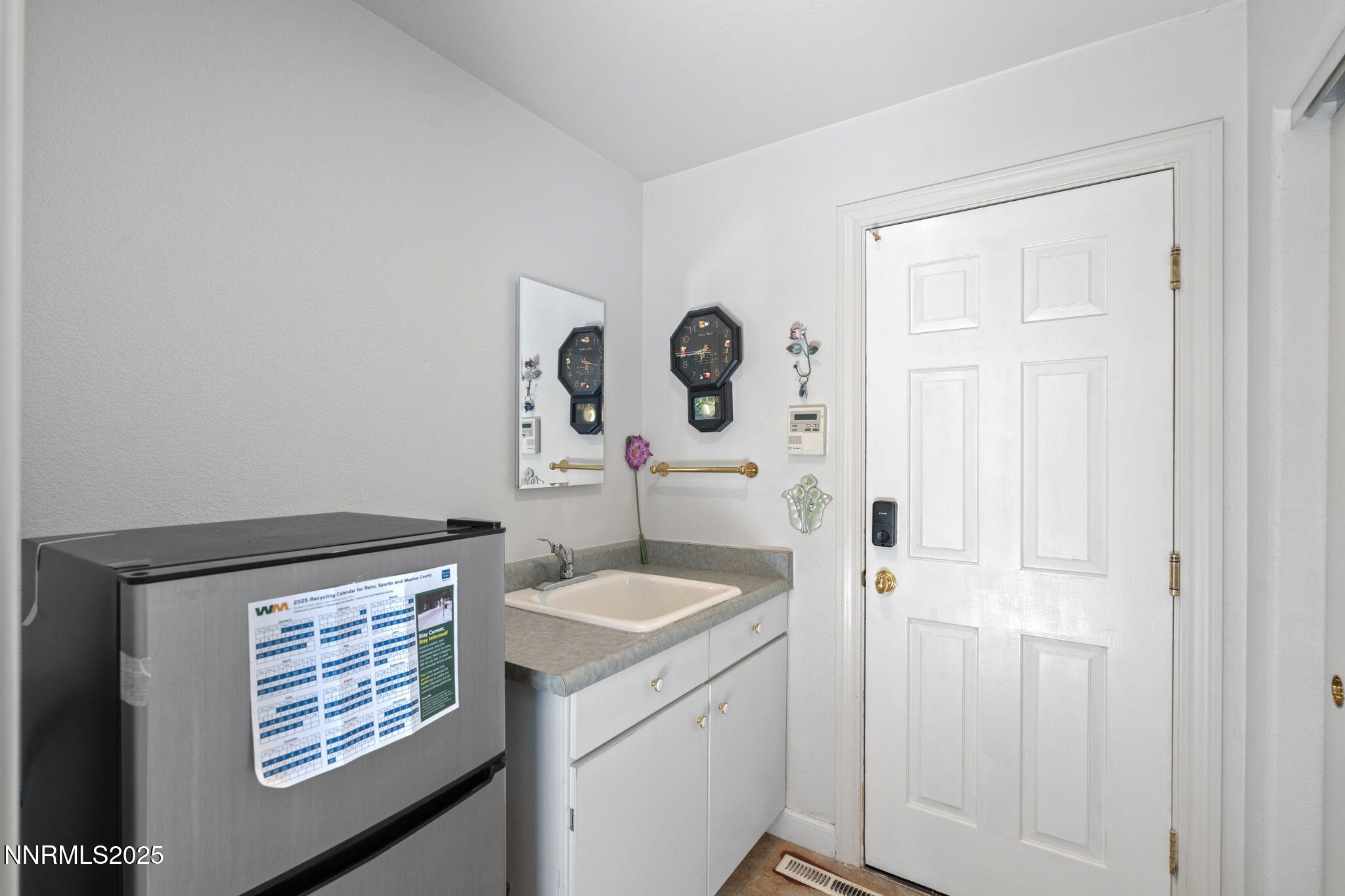 5195 Canyon Drive Reno, NV 89519 - Photo 40 of 69 a room with a sink and a window