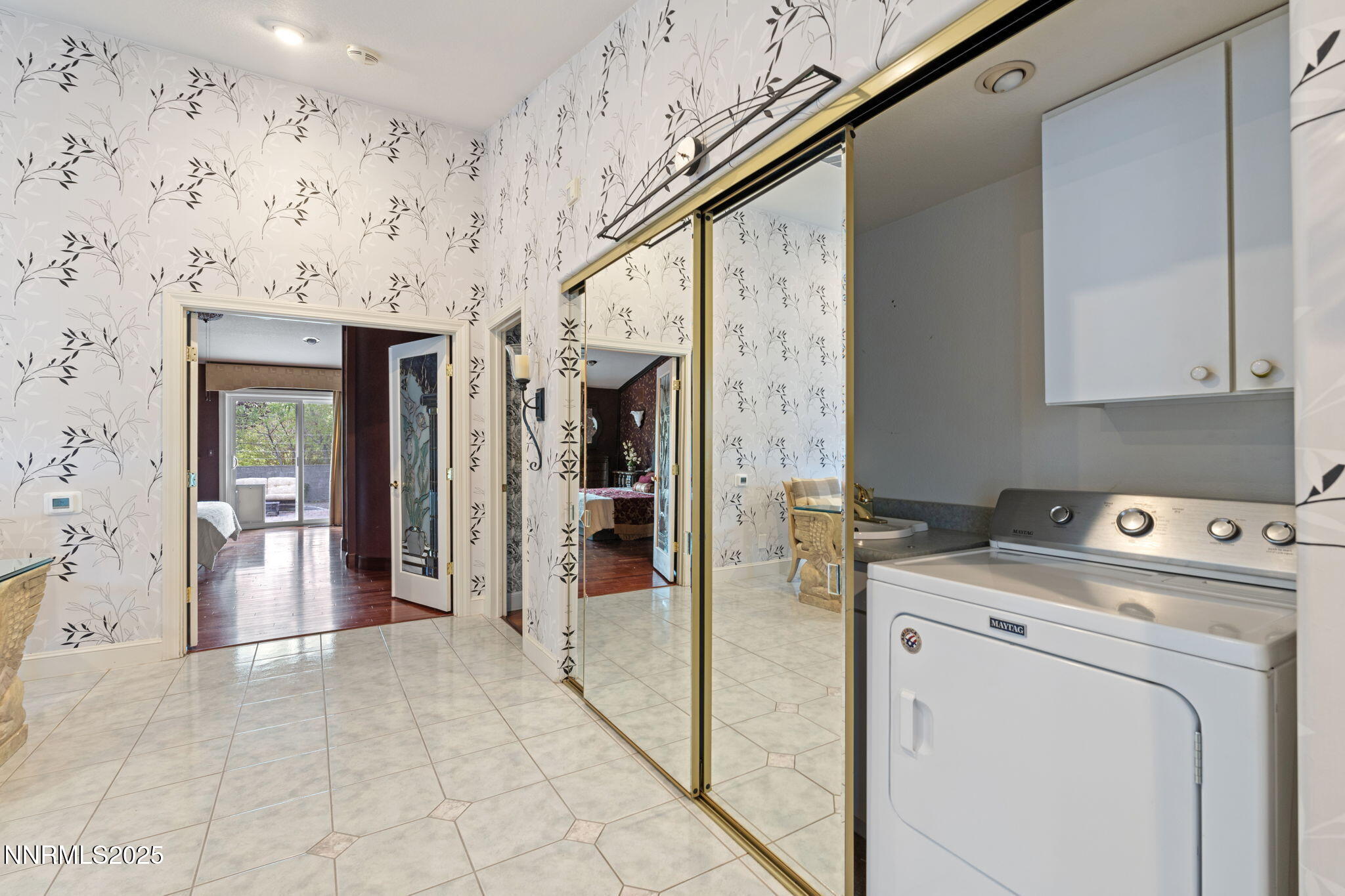 5195 Canyon Drive Reno, NV 89519 - Photo 41 of 69 a view of a hallway with washer and dryer