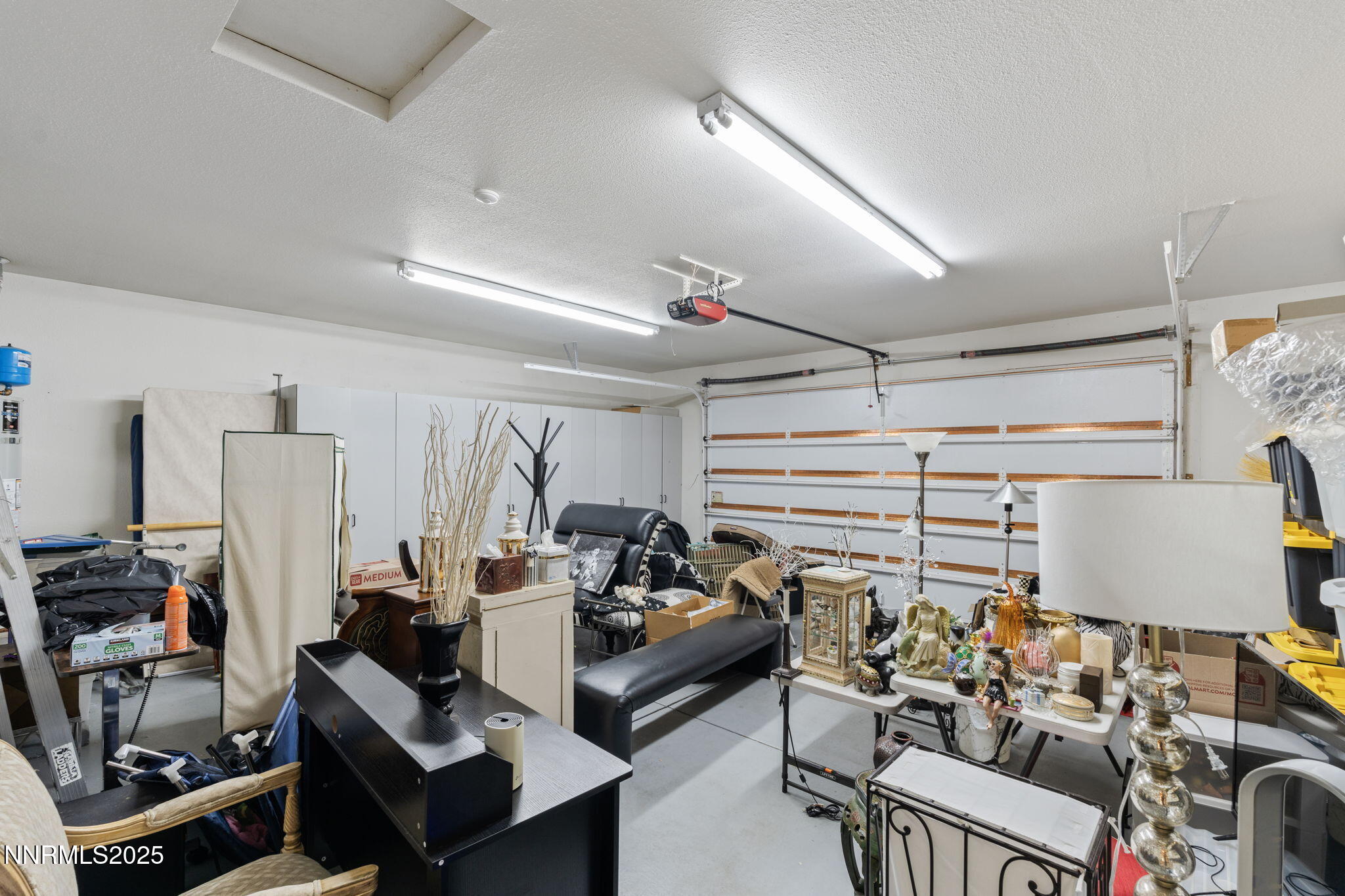 5195 Canyon Drive Reno, NV 89519 - Photo 42 of 69 a living room with furniture a flat screen tv and a window