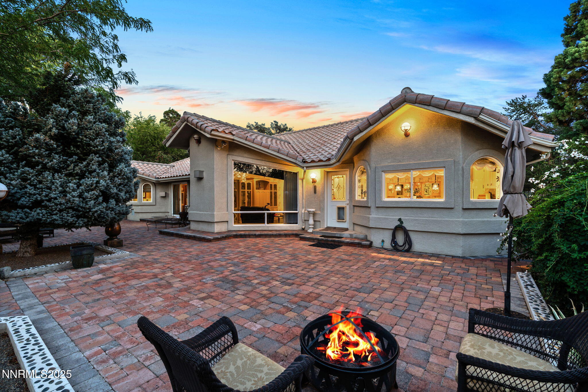 5195 Canyon Drive Reno, NV 89519 - Photo 49 of 69 a front view of a house with a yard