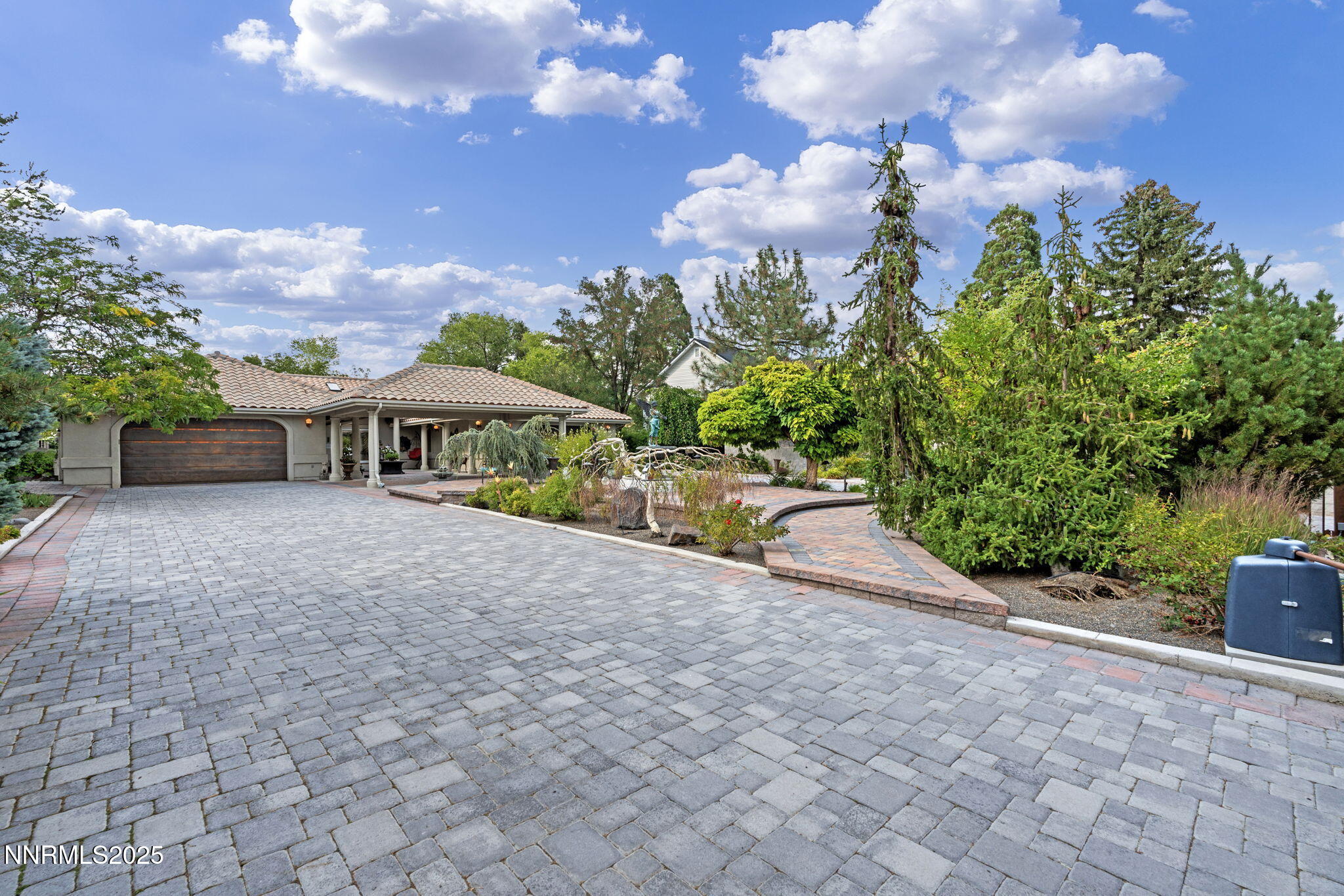 5195 Canyon Drive Reno, NV 89519 - Photo 53 of 69 a view of a house with yard and a garden