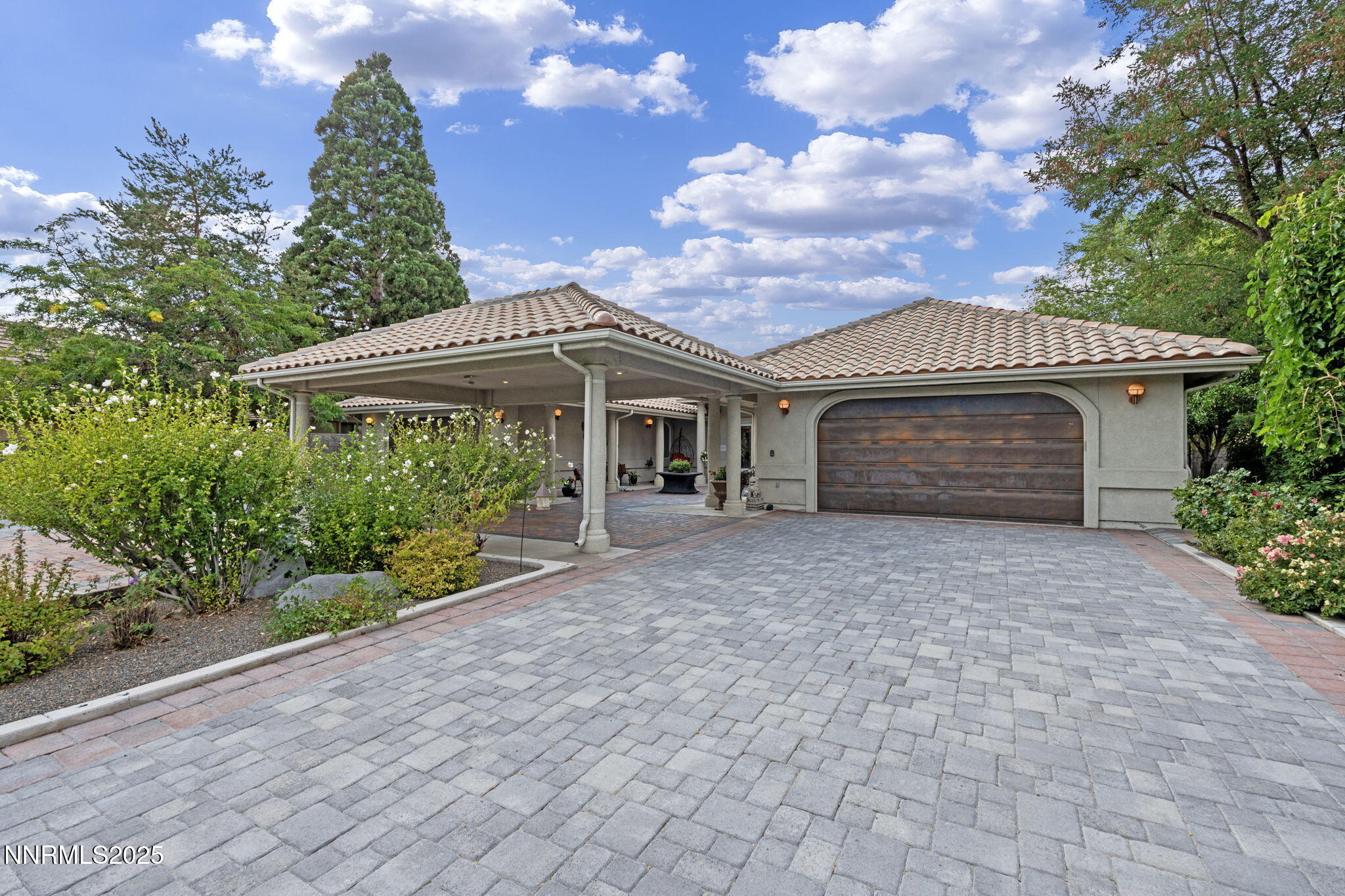 5195 Canyon Drive Reno, NV 89519 - Photo 57 of 69 a front view of a house with a garden