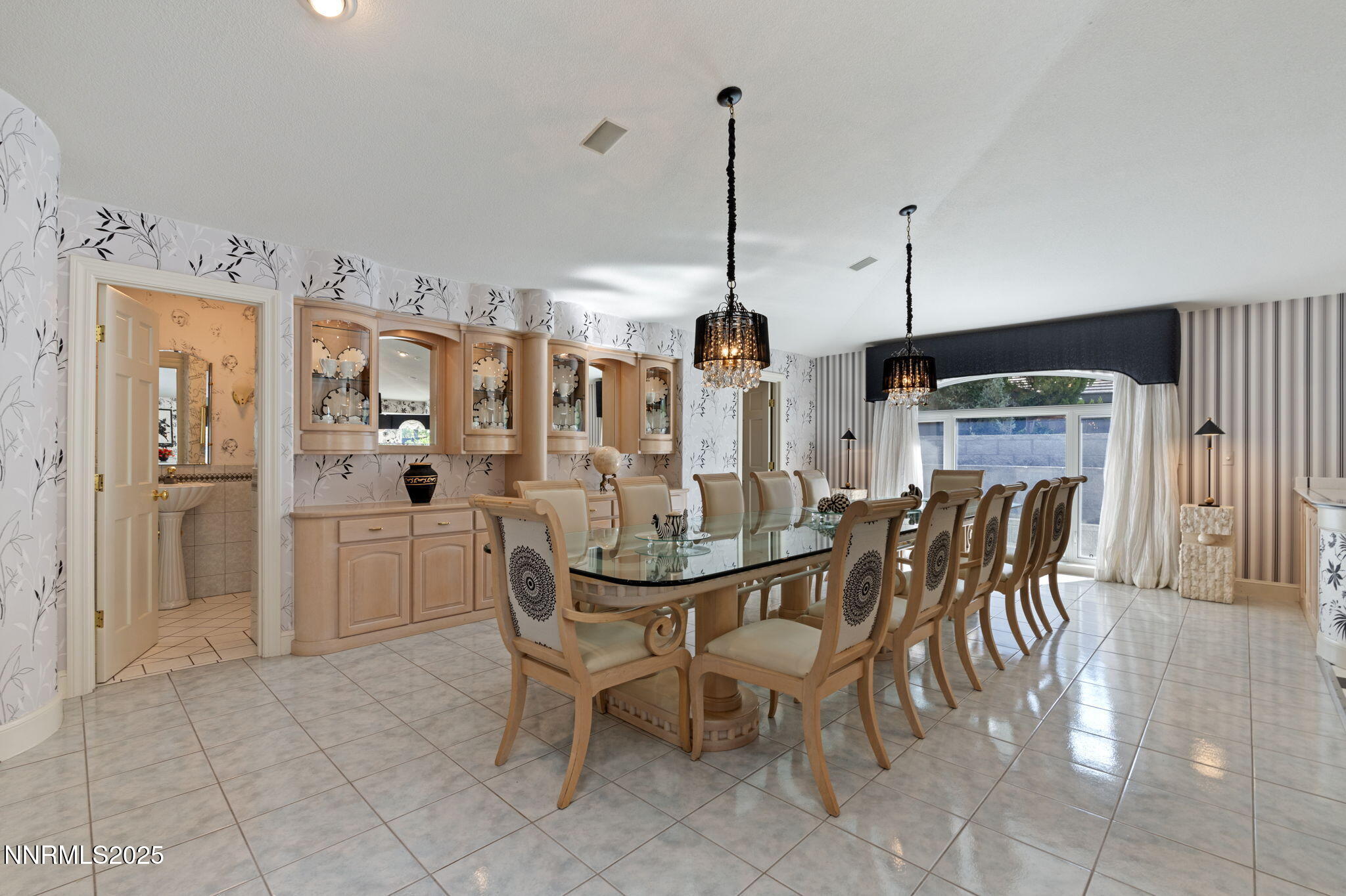 5195 Canyon Drive Reno, NV 89519 - Photo 9 of 69 a view of a dining room with furniture and chandelier