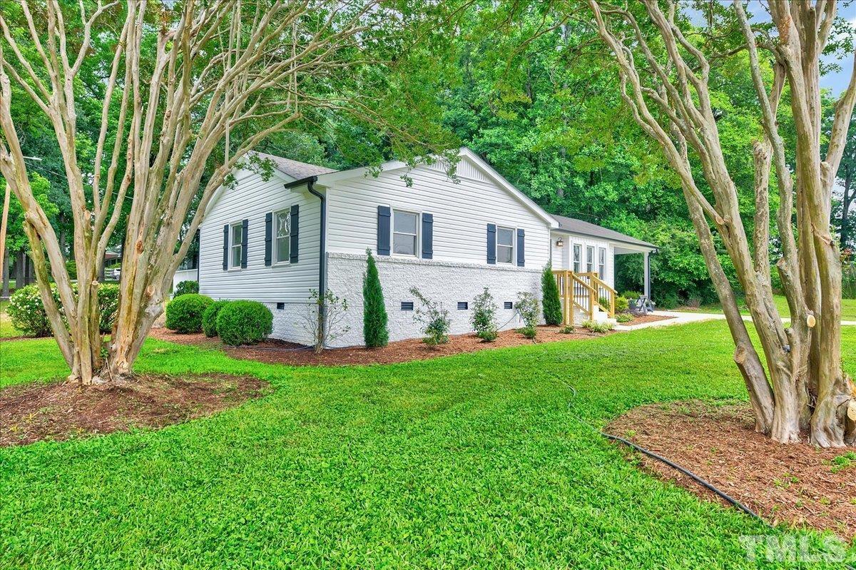 3708 Oakvale Street Raleigh, NC 27603 - Photo 3 of 39 a front view of house with yard and green space