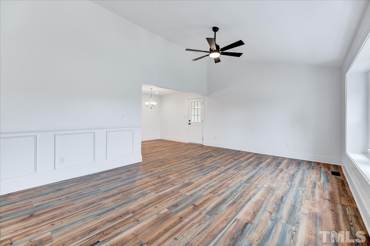 3708 Oakvale Street Raleigh, NC 27603 - Photo 8 of 39 wooden floor in an empty room