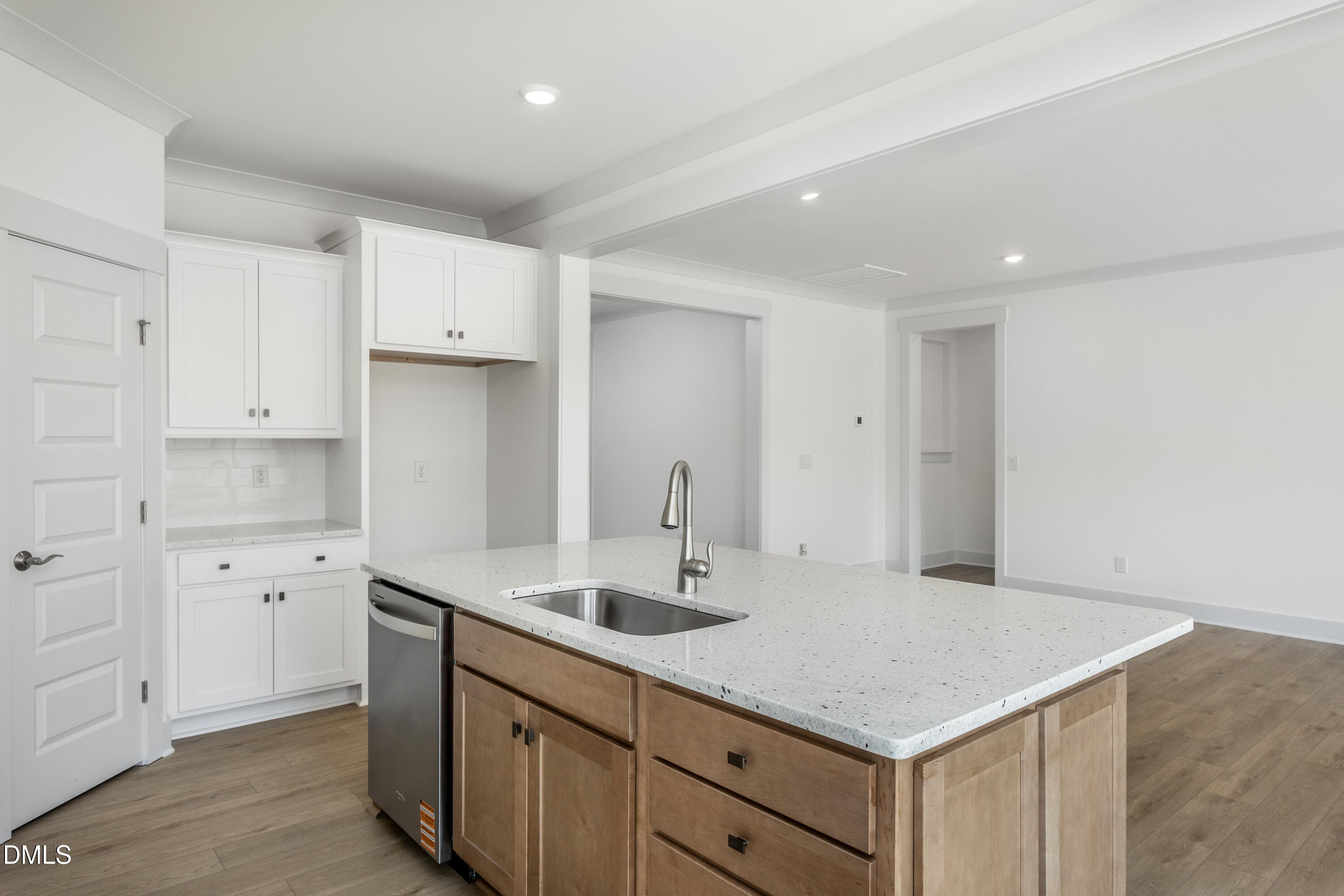70 Slippery Elm Road Youngsville, NC 27596 - Photo 11 of 32 a kitchen with cabinets appliances and a sink