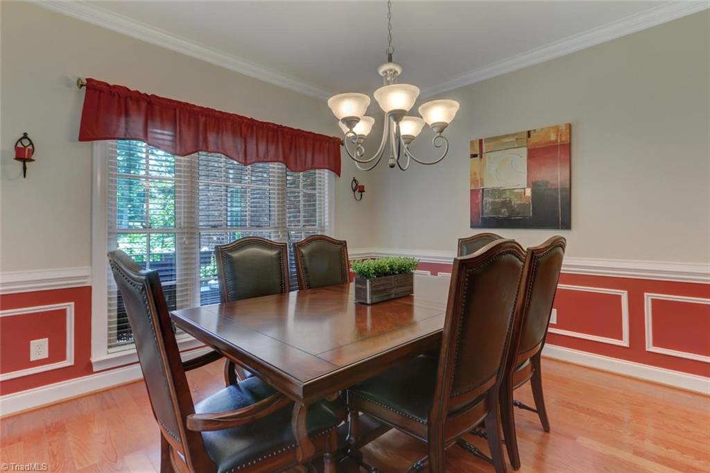 605 Stafford Pointe Court Oak Ridge, NC 27310 - Photo 14 of 30 For those formal occasions, you will appreciate this well appointed dining room. Note that if you need an office downstairs, the large breakfast area adjacent to the kitchen, could be used as the dining room.