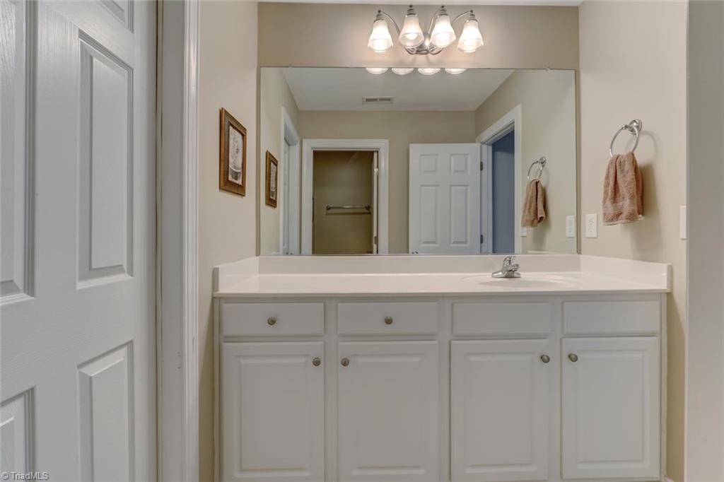 605 Stafford Pointe Court Oak Ridge, NC 27310 - Photo 23 of 30 A second upstairs bathroom services the additional bedrooms or bonus.