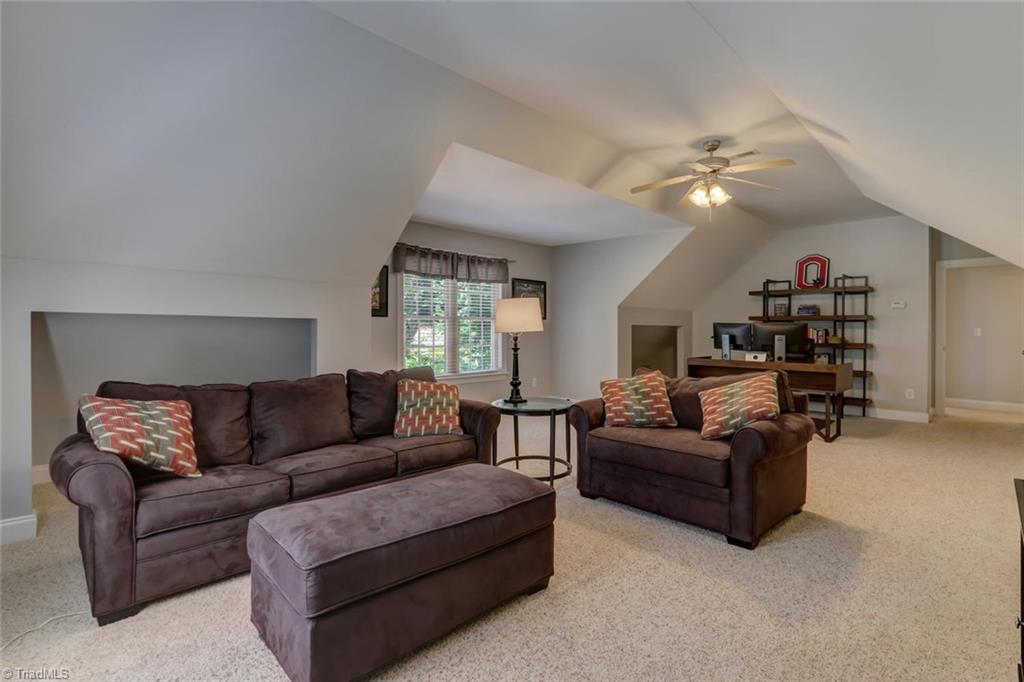 605 Stafford Pointe Court Oak Ridge, NC 27310 - Photo 25 of 30 This bedroom/optional bonus is huge and offers you lots of choices.