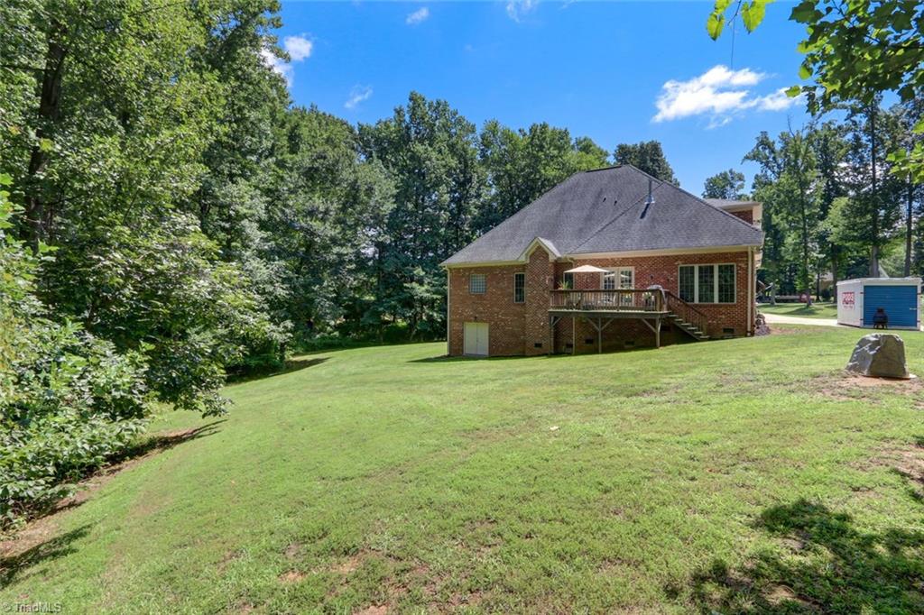 605 Stafford Pointe Court Oak Ridge, NC 27310 - Photo 28 of 30 Lots of back yard for the kids or animals to play. NOTE: The entire lot is surrounded by invisible fencing to keeo your pets safe.