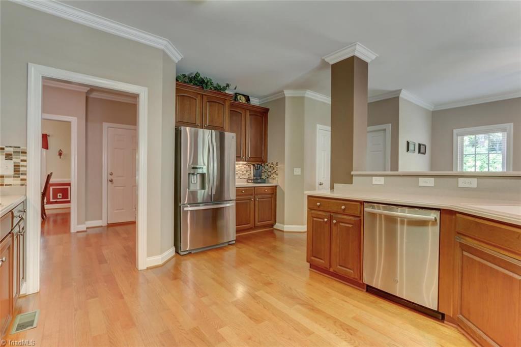 605 Stafford Pointe Court Oak Ridge, NC 27310 - Photo 10 of 30 This huge kitchen gives the chef plenty of room to work their magic and entertain guests at the same time