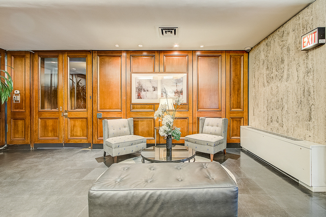 720 West Gordon Terrace, Unit 5B Chicago, IL 60613 - Photo 18 of 20 a living room with furniture and large windows