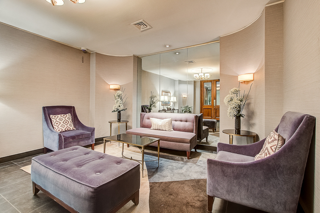 720 West Gordon Terrace, Unit 5B Chicago, IL 60613 - Photo 19 of 20 a living room with furniture and wooden floor