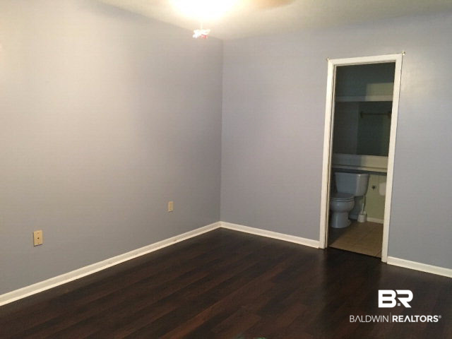 1128 North Alston Street, Unit 1128 Foley, AL 36535 - Photo 14 of 24 Master Bedroom