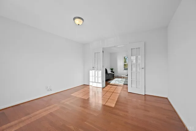 a view of a livingroom with furniture and wooden floor