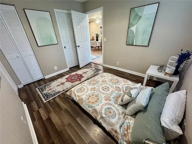 a view of a balcony with wooden fence
