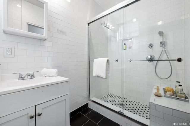 a view of a chairs and table in the patio