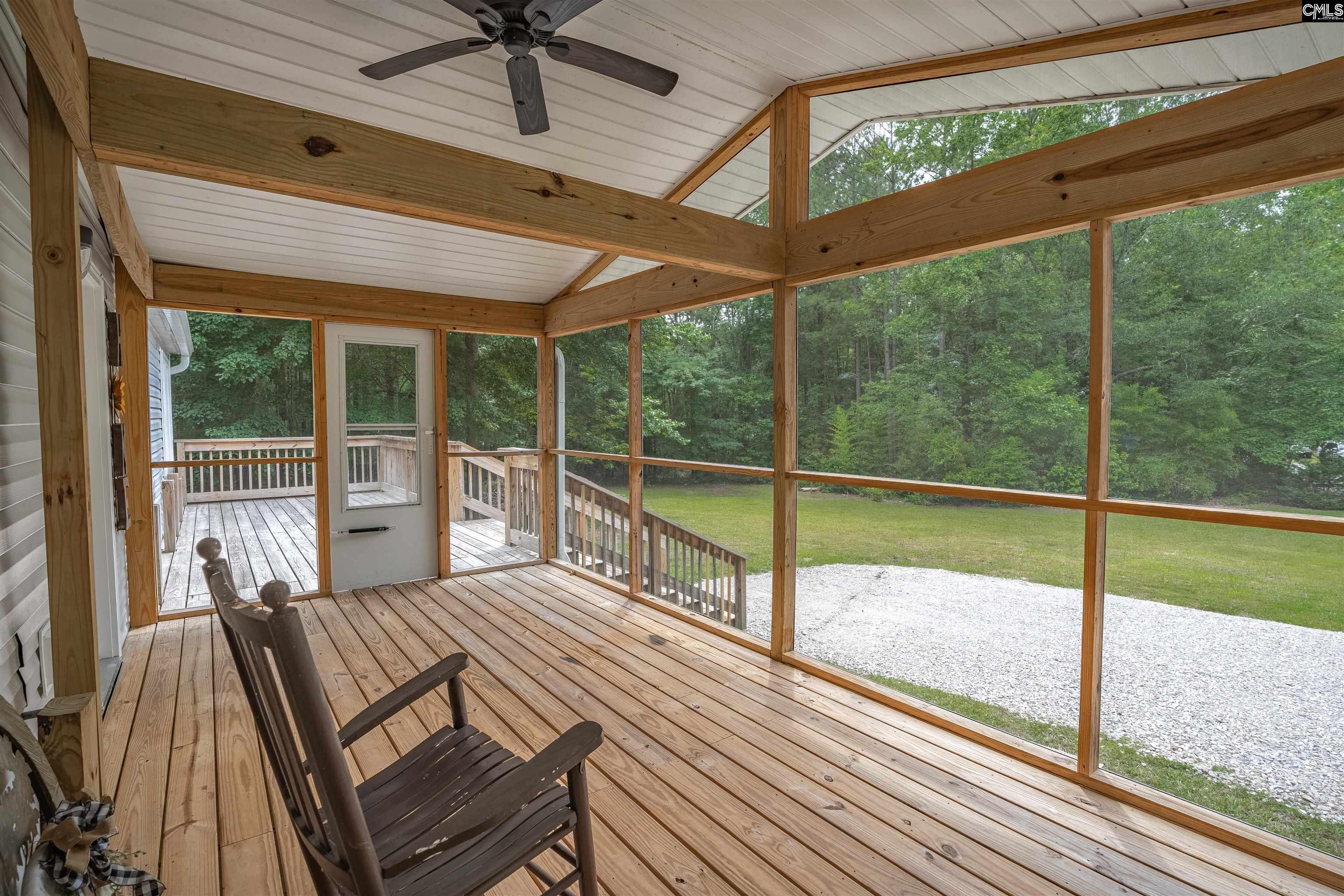 304 Cooper Road Blythewood, SC 29016 - Photo 5 of 29 a view of a two room with wooden floor and windows