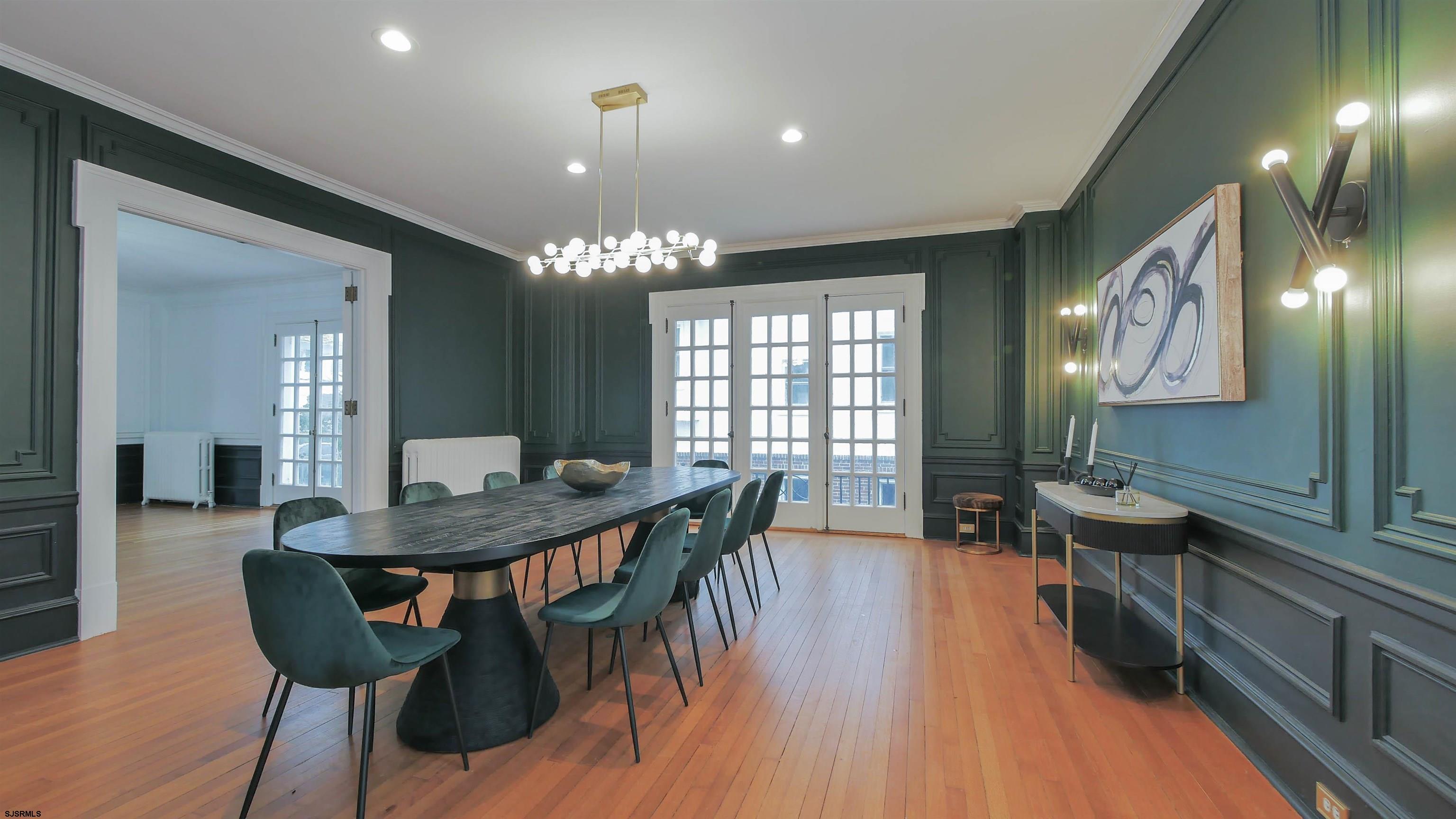 4700 Atlantic Avenue Atlantic City, NJ 08401 - Photo 14 of 74 a view of a dining room with furniture and wooden floor