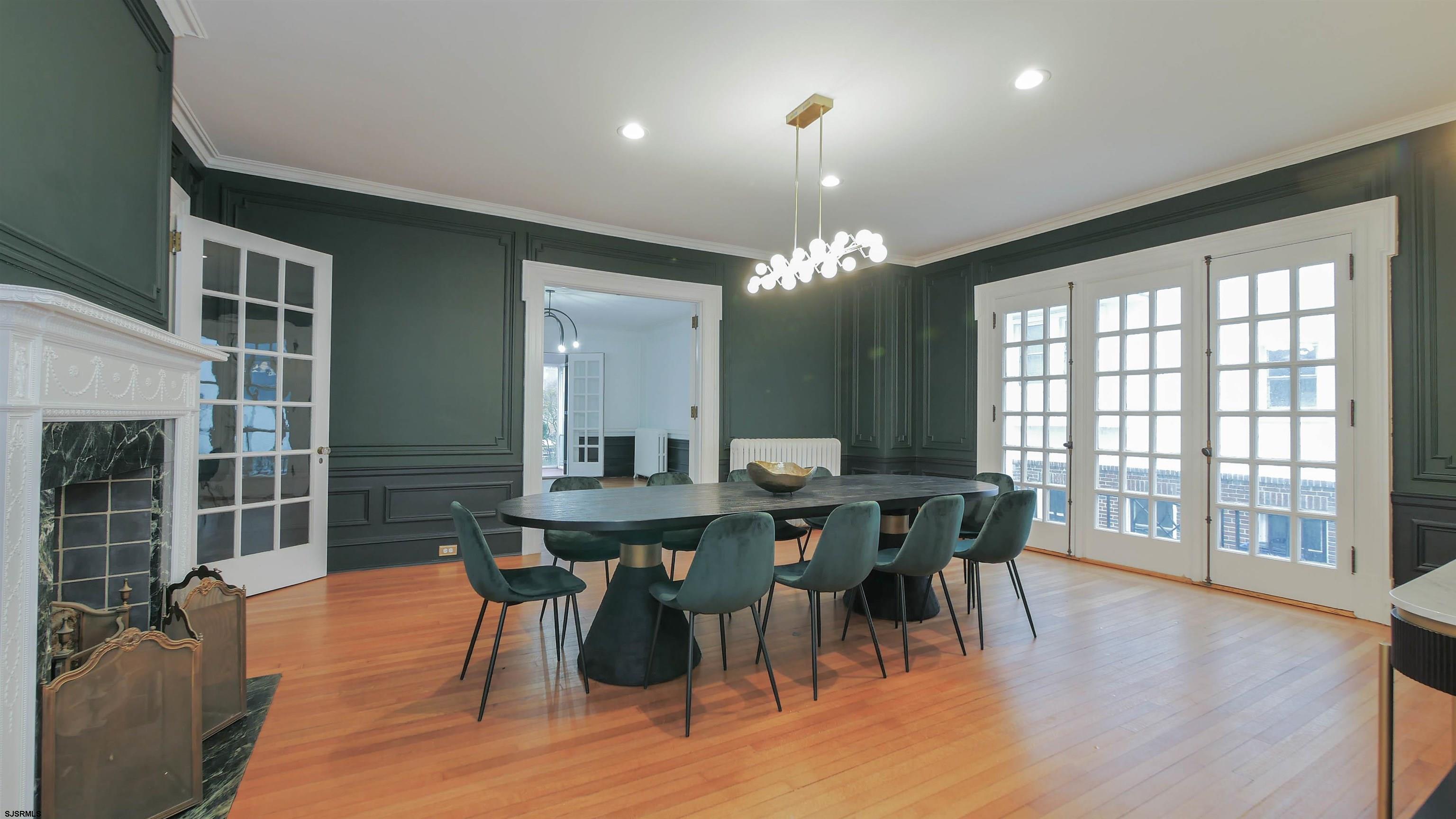 4700 Atlantic Avenue Atlantic City, NJ 08401 - Photo 16 of 74 a view of a dining room with furniture window and wooden floor