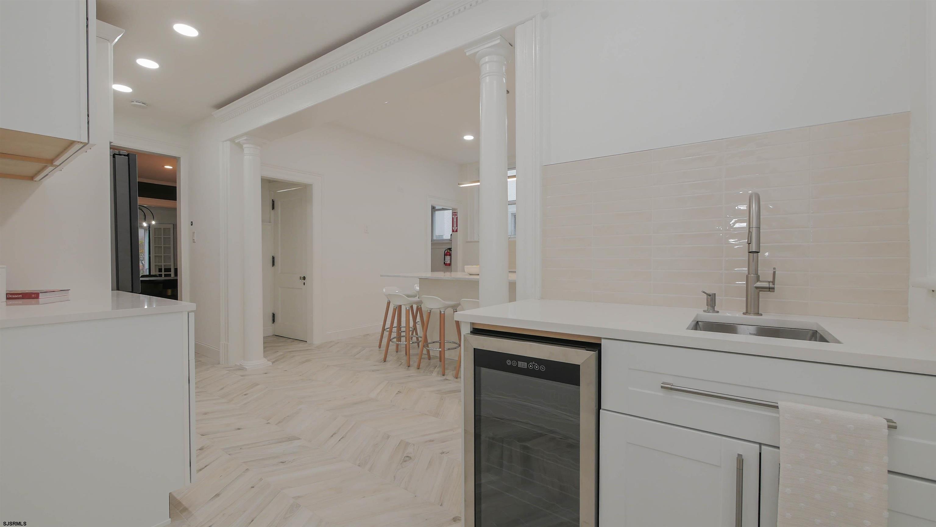 4700 Atlantic Avenue Atlantic City, NJ 08401 - Photo 22 of 74 a bathroom with a sink and a mirror