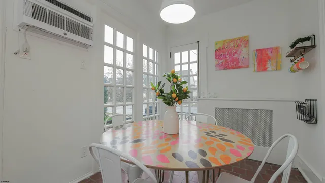 a view of entryway with wooden floor and stairs
