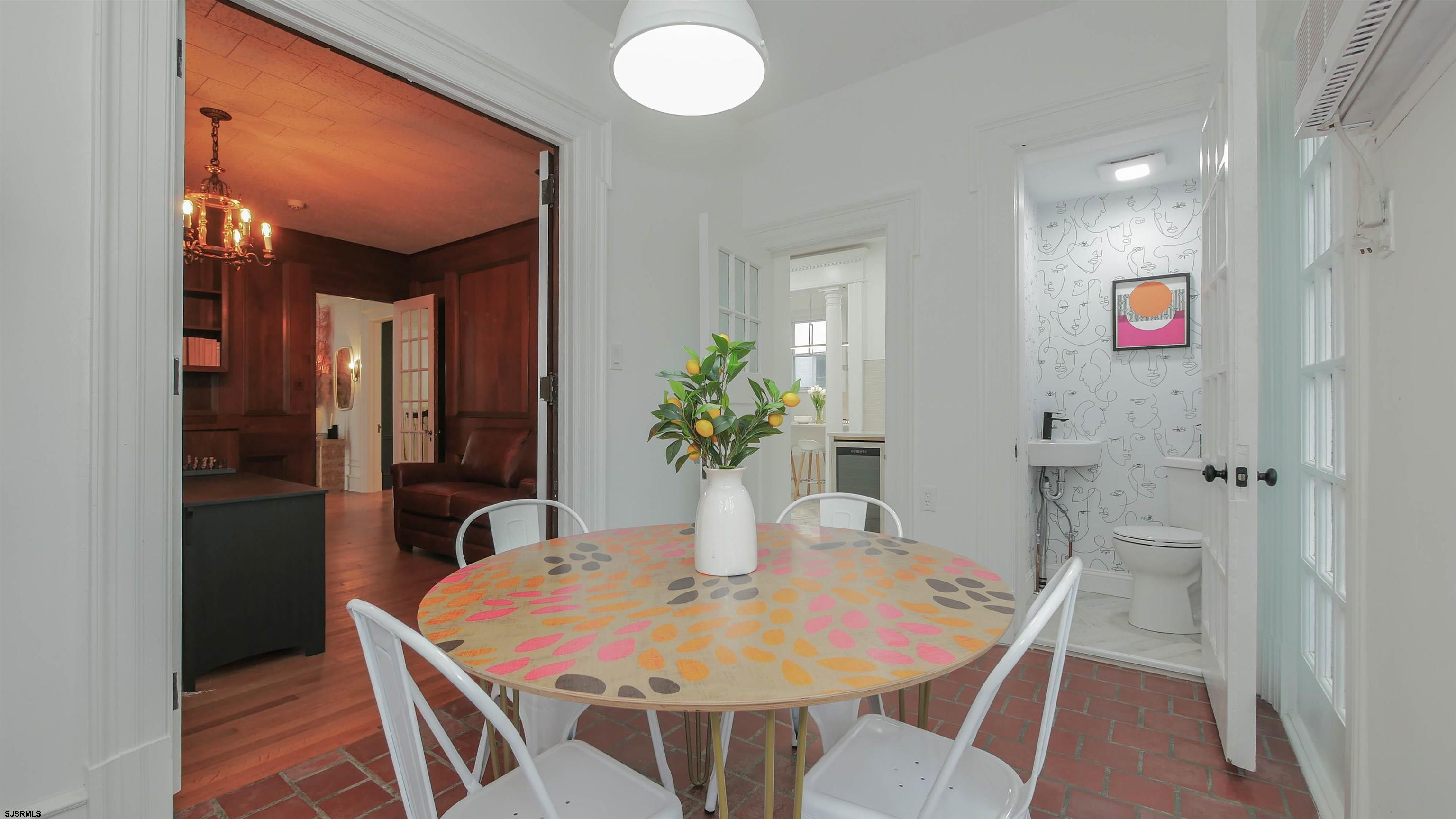 4700 Atlantic Avenue Atlantic City, NJ 08401 - Photo 24 of 74 a dining room with furniture and wooden floor