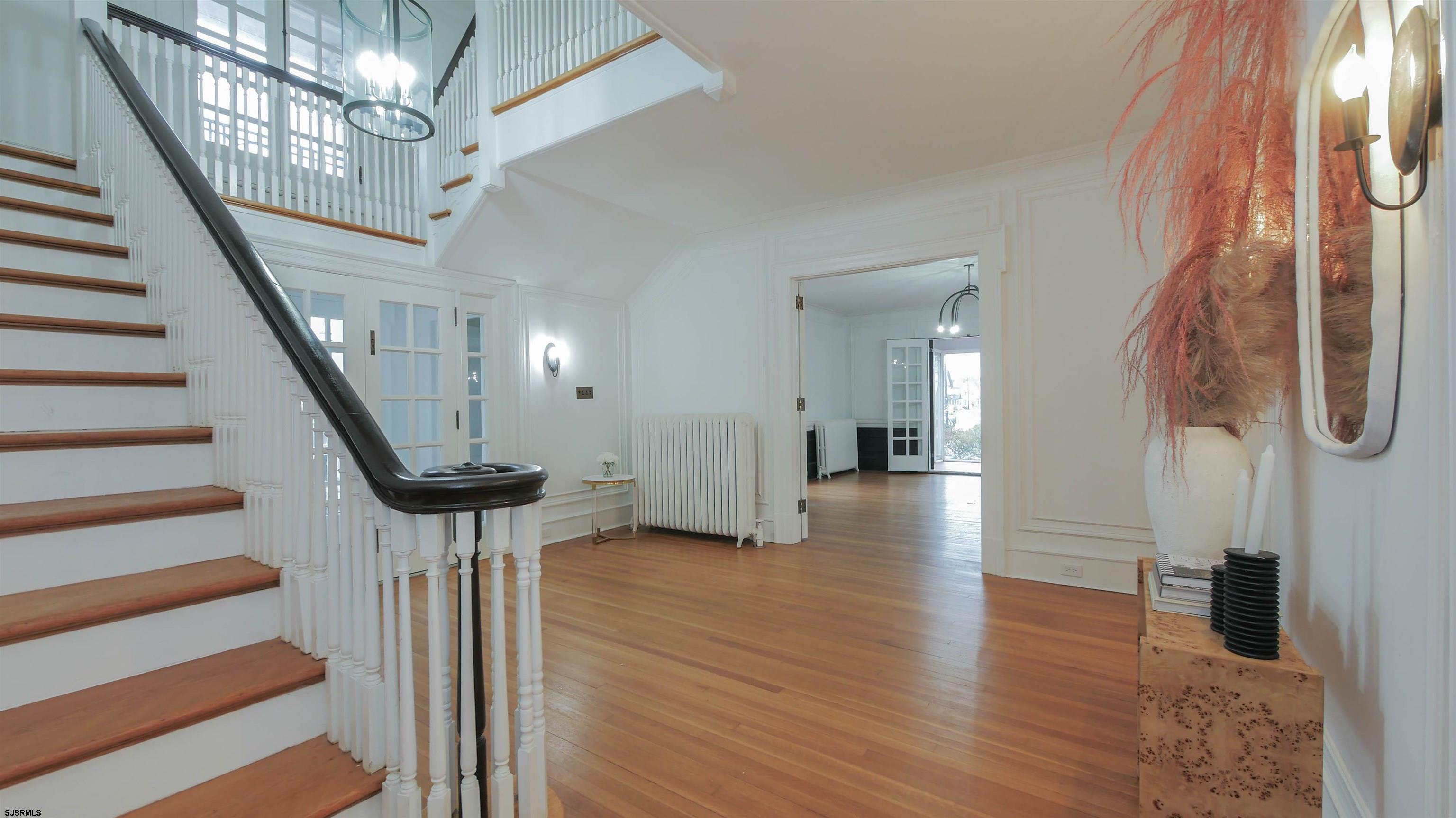 4700 Atlantic Avenue Atlantic City, NJ 08401 - Photo 30 of 74 a view of entryway with wooden floor and stairs
