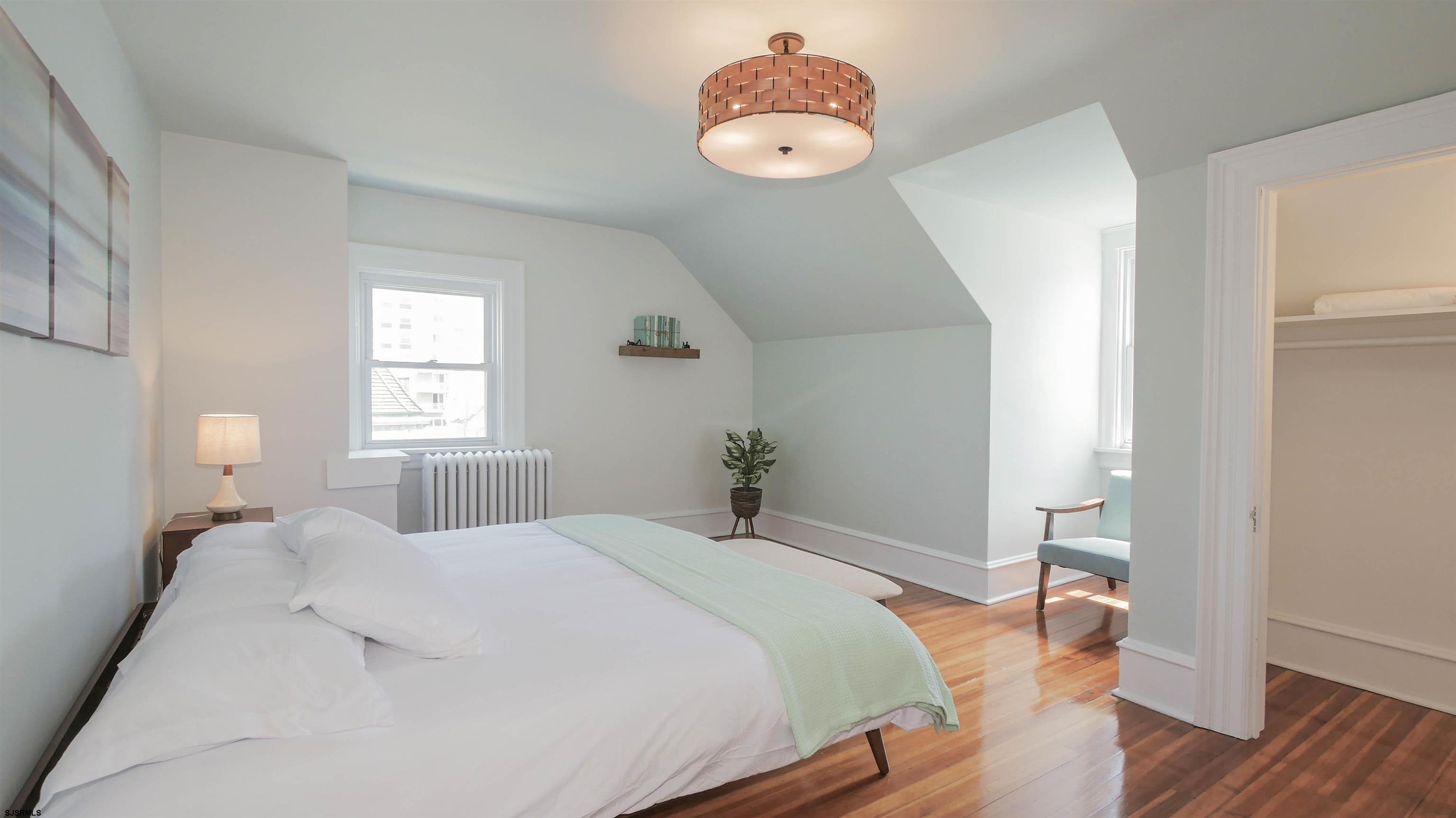 4700 Atlantic Avenue Atlantic City, NJ 08401 - Photo 62 of 74 a bedroom with a bed and a window