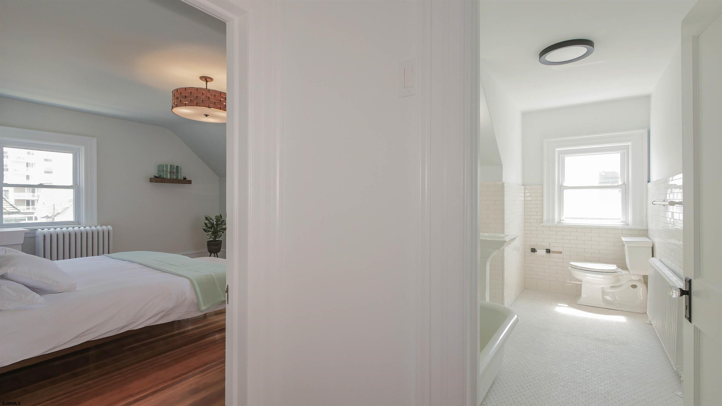 4700 Atlantic Avenue Atlantic City, NJ 08401 - Photo 65 of 74 a bedroom with a bed and a window