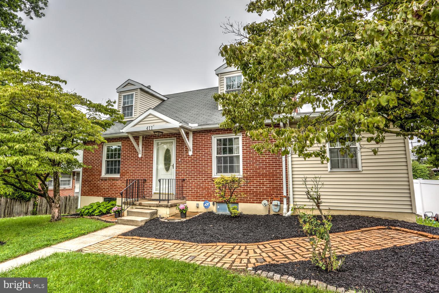 411 Haig Boulevard Reading, PA 19607 - Photo 4 of 36 Front of Home with Sidewalk and Brick Walkway