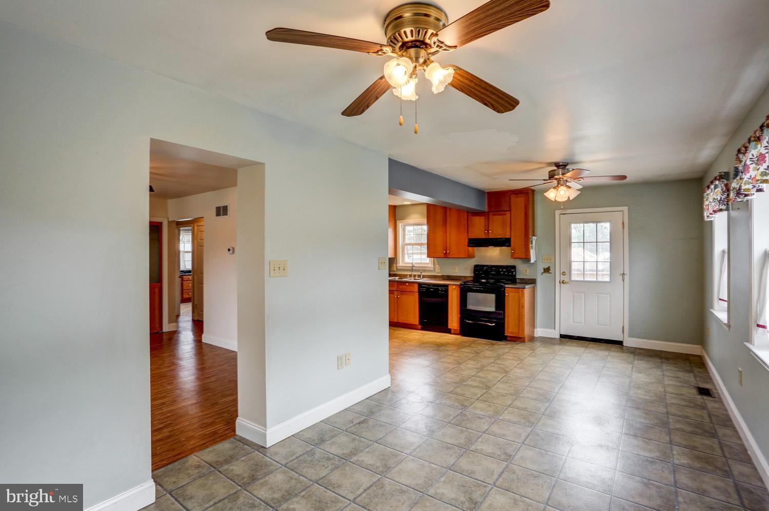 411 Haig Boulevard Reading, PA 19607 - Photo 8 of 36 Dining area looking into Kitchen & Door to Deck