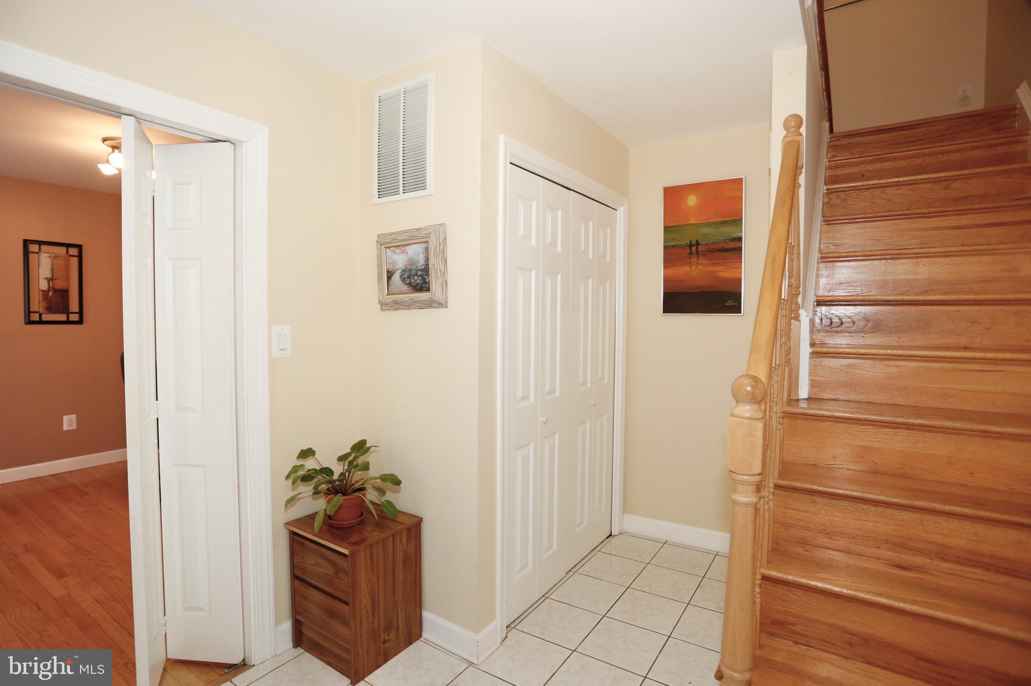 314 Summit Hall Road Gaithersburg, MD 20877 - Photo 3 of 31 Steps and closet as viewed from entrance foyer