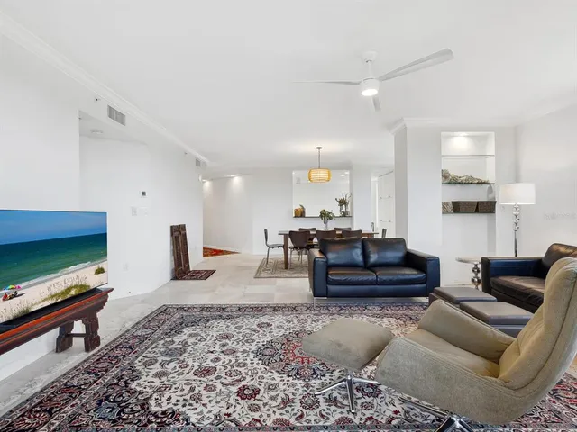 a kitchen with white cabinets a sink and dishwasher