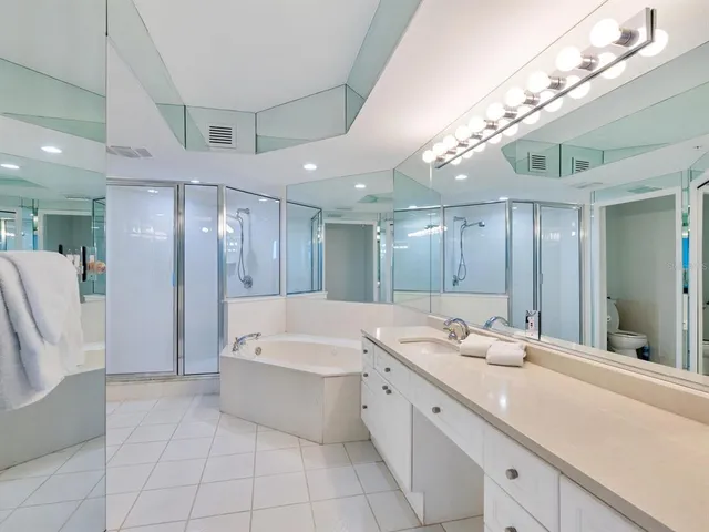 a utility room with sink dryer and washer